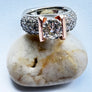 Tension diamond ring made 14 karat white gold