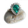 Large Pear Shape Emerald with diamonds in 14 karat yellow gold