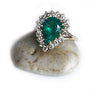 Large Pear Shape Emerald with diamonds in 14 karat yellow gold