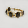 Black Spinel Ring with Diamonds in 18 Karat Yellow Gold