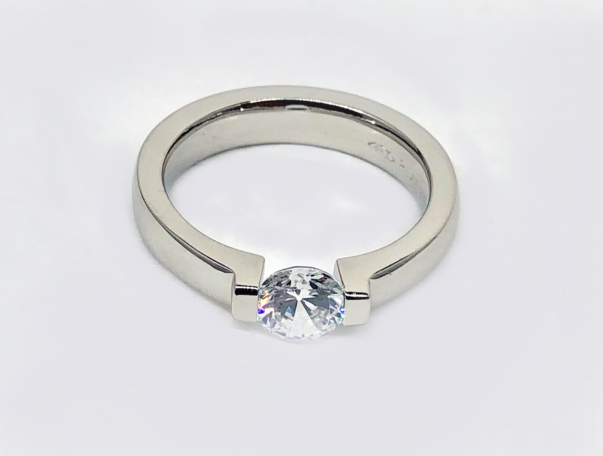 Platinum Tension Engagement Ring | TheNetJeweler