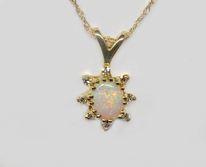 Opal Pendant 14 Karat Yellow Gold and Diamonds