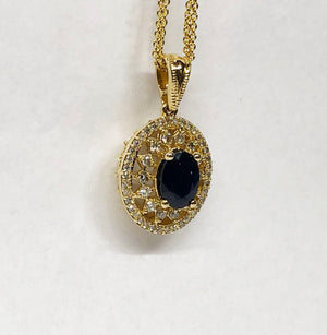 Sapphire and Diamond Pendant in 14 Karat Yellow Gold