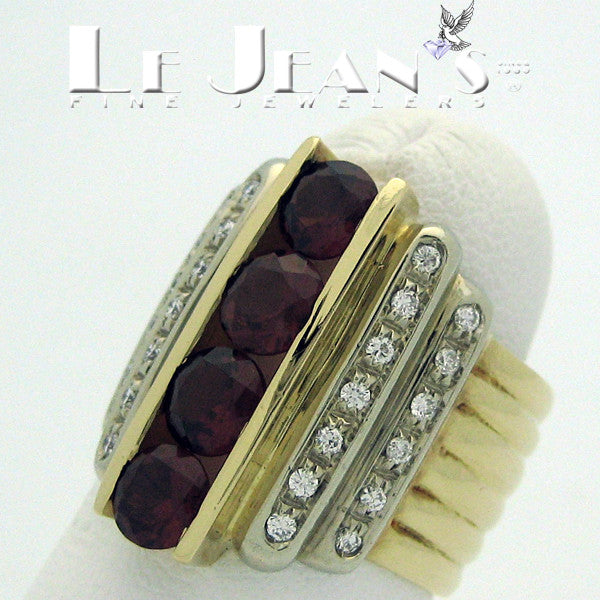 Garnet and Diamond ring in 14 karat gold